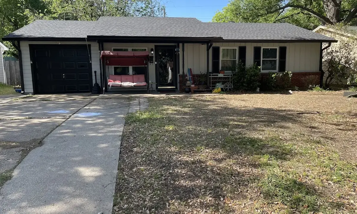Roof Replacement crew at work on a residential roof in Savannah
